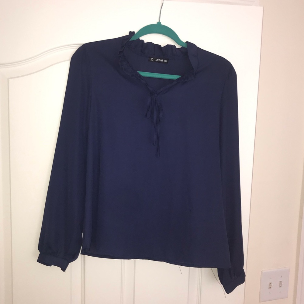 Long sleeve ruffled blouse
